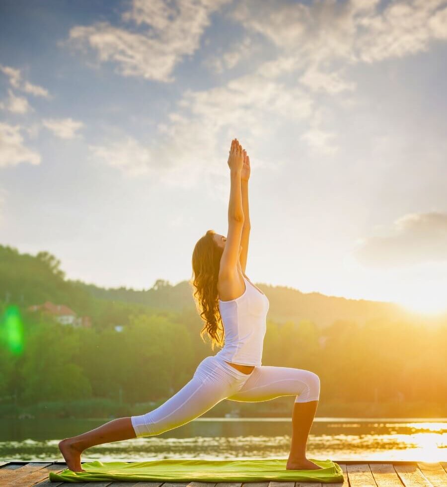 lady performing yoga outdoors