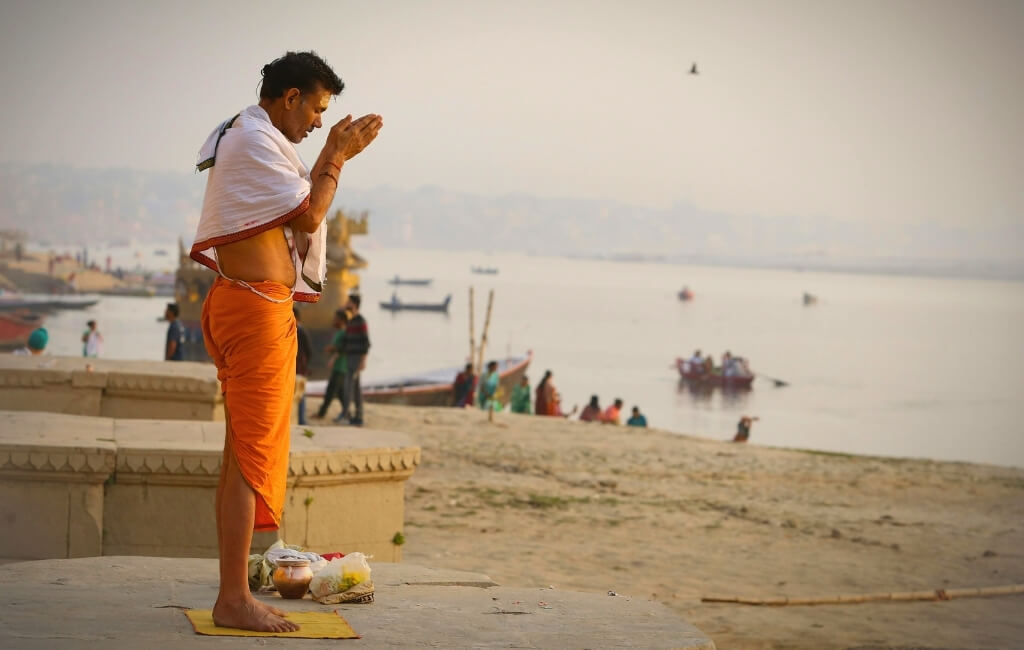man meditating in varanasi