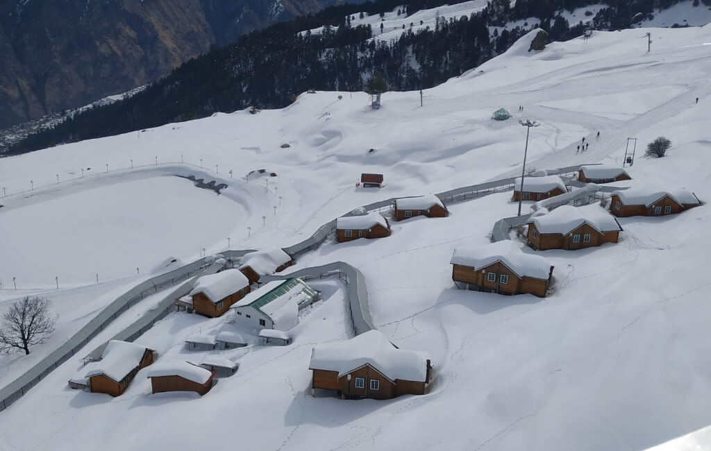 Snow Covered Houses in Auli